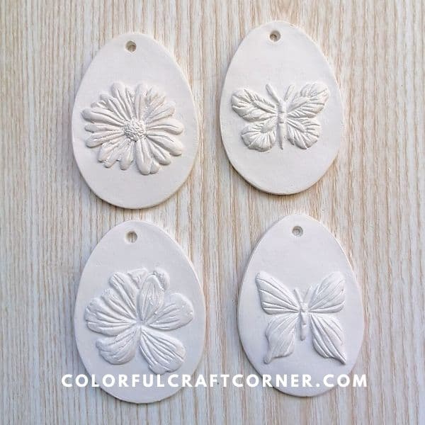 whit Easter hanging ornaments out of clay
