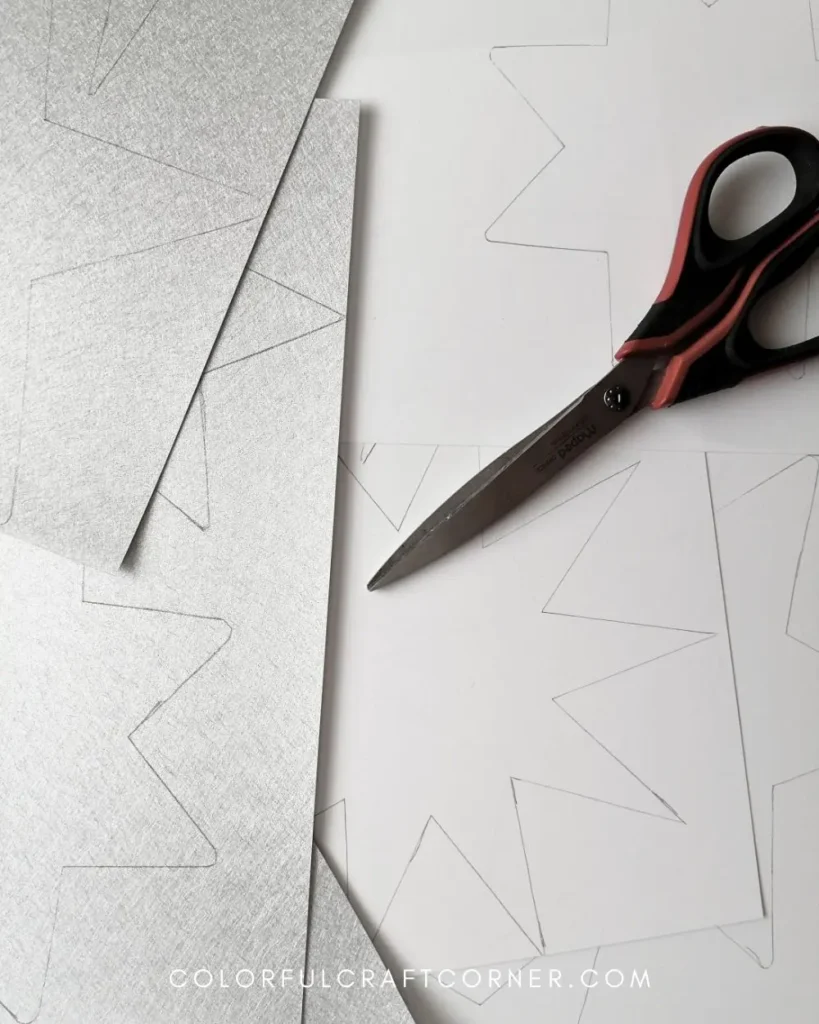 cutting shrink plastic star shapes for ornaments